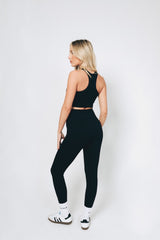 Black ribbed athleisure ribbed set from sosala of bralet and leggings 